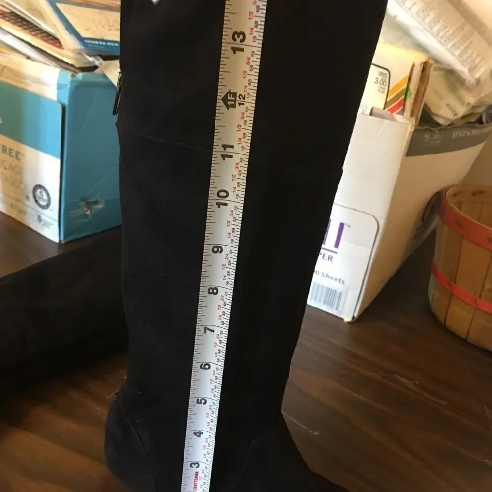 Little girl black suede over the knee boots.